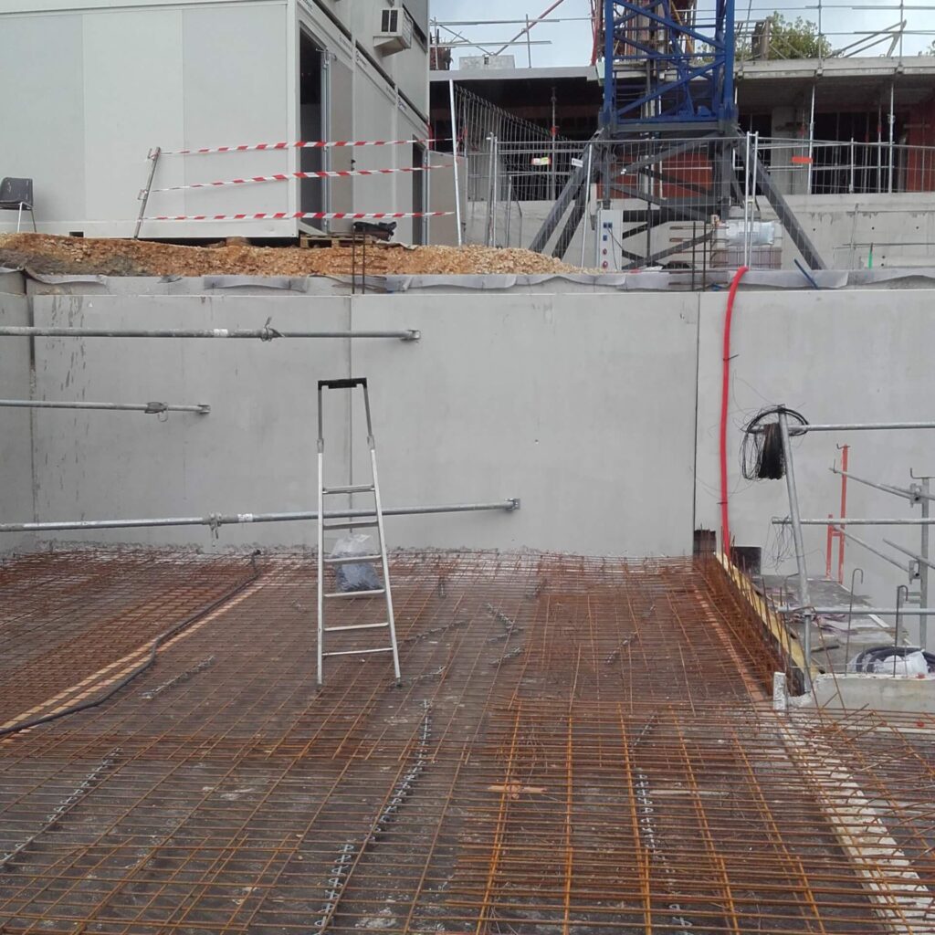 Ferraillage d'une dalle béton avec recouvrements et cales d'enrobage
